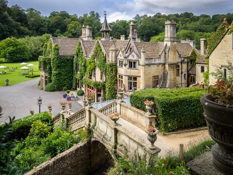 Castle Combe Manor House | This extraordinary estate is now a 5-star hotel and golf club. The house was built in the 14th century and has 48 rooms and 365 acres (1.5 km2) of gardens. The grounds' Italian, Classical and medieval Gothic styled gardens and summerhouse were added in the mid-19th century and are still maintained today. Castle Combe Manor House, Shifting Places, Old English Manor, Tv Houses, English Estates, Manor House Hotel, English Estate, 19th Century England, Setting Inspiration