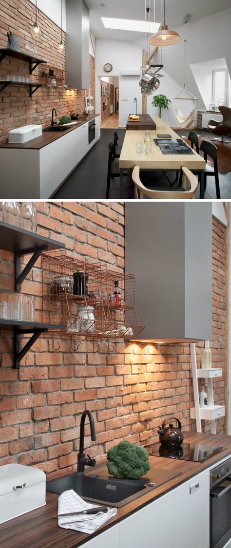 This contemporary loft apartment built inside a 19th-century building will leave you dazed with its large adaptable open space and urban, bohemian look. Modern Loft Apartment, Kitchen Loft, Contemporary Loft, Grey Floor Tiles, Brick Kitchen, Brick And Wood, Kitchen And Dining Room, Kitchen Wall Tiles, Modern Loft