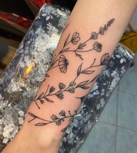 Adding To A Tattoo Ideas, Sleeve Wrap Tattoo, Botanical Wrap Tattoo Upper Arm, Fine Line Floral Arm Wrap Tattoo, Wildflower Wrap Around Tattoo, Sunflower Wrap Around Tattoo, Flower Wrap Tattoo, Forearm Wrap Around Tattoo, Wrap Around Forearm Tattoo Women