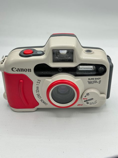 canon WP-1 Sure shot waterproof 35mm film camera mint professionally serviced 90 day warranty! Absolutely beautiful condition and working perfectly. Simple camera to use Beginner Photography Camera, Alexandria Bay, Simple Camera, Vinyl Aesthetic, Cute Camera, Retro Gadgets, Canon Camera, Photography For Beginners, Vintage Cameras