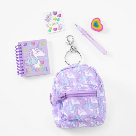 This purple unicorn stationery set is perfect for school! Everything you need, such as: a pen, eraser, stickers, notebook, and a mini keychain backpack, will have you as the talk of the classroom. With matching supplies, you can be stylish out of school and IN school. Included: 1 pen, 1 eraser, 1 notebook, 1 sticker sheet, 1 keychain backpack Backpack Dimensions: 3.5'' W x 4'' H x 1.5'' D Material: Plastic - Claire's Purple Unicorn 4'' Backpack Stationery Set Mini School Supplies, Unicorn Stationery, Shopkin Dolls, Unicorn School Supplies, Pen Eraser, Mini Keychain, Barbie Doll Set, Doll Backpack, Keychain Backpack