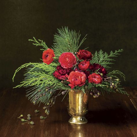 39 Christmas Centerpieces for Your Holiday Table | Southern Living Amaryllis Christmas, Holiday Flower Arrangements, Winter Floral Arrangements, Red Amaryllis, Festive Centerpieces, Christmas Bouquet, Christmas Flower Arrangements, Christmas Table Centerpieces, Holiday Arrangement