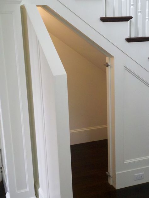 Hidden Door to storage. Toby Leary Fine Woodworking - entrances/foyers - traditional staircase, hidden nook, hidden storage nook, faux panels, faux paneling, faux s... Door Under Stairs, Stairway Storage, Understair Storage, Closet Under Stairs, تحت الدرج, Wainscoting Stairs, Basement Room, Hidden Doors, Wainscoting Styles