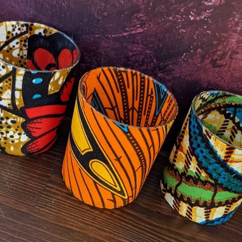 Check out this item in my Etsy shop https://www.etsy.com/uk/listing/275029344/african-candle-holder-set-random-mix-of