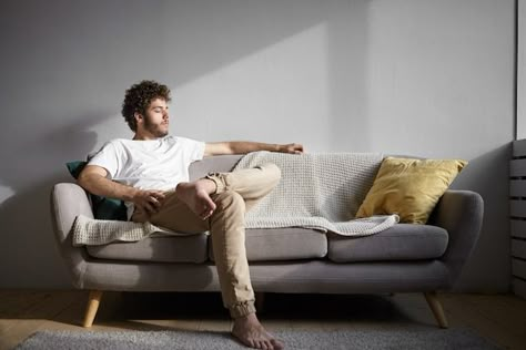 Men With Stubble, Red Checkered Shirt, Mens Photoshoot Poses, Cozy Couch, Man Photography, Men Photography, Sitting Poses, Man Sitting, Rest And Relaxation