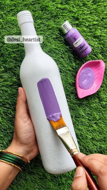 Art by Heart shared a post on Instagram: "Hey Purple Beauty💜💕 . . Watch full process video step by step on YouTube▶️ Link in bio🔄🔝 . . #dotartonbottle #bottleartlover #bottleartindia #bottleart #bottlecraft #easydiy #easybottleart #bottledecoration #bottledecor #bottlereuseidea #paintingoftheday #purple #pink #moneyplant #moneytree #bottlepainting #bottlereels #dotartbottleart #glassbottlepainting #glasspainting #happyheartist #jyoshitaghate". Follow their account to see 540 posts. How To Paint Glass Bottles Step By Step, Lavender Bottle Art, Purple Bottle Art, Painting Mason Jars Ideas, Easy Wine Bottle Painting Ideas, Glass Bottles Art Paint Aesthetic, Plastic Bottle Art Paint, Glass Bottle Painting Ideas Easy, Aesthetic Bottle Painting