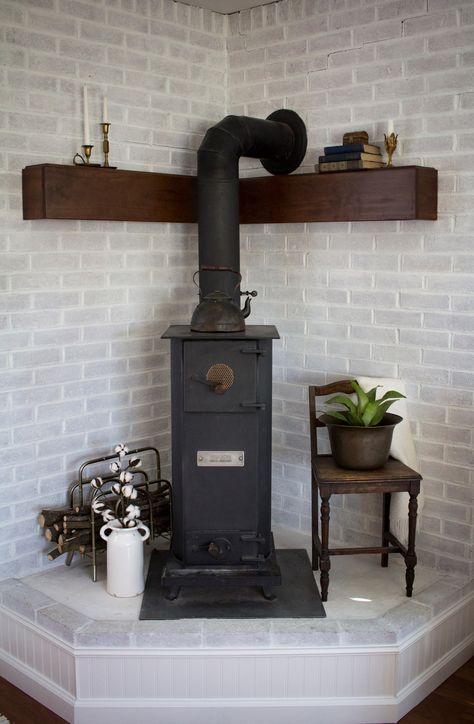 Brick Wood Stove Hearth, Pellet Stove Ideas Corner, Corner Pellet Stove Ideas Living Rooms, Stove Makeover, Hearth Makeover, Corner Hearth, Pellet Stove Hearth, Wood Stove Decor, Wood Burning Stove Corner