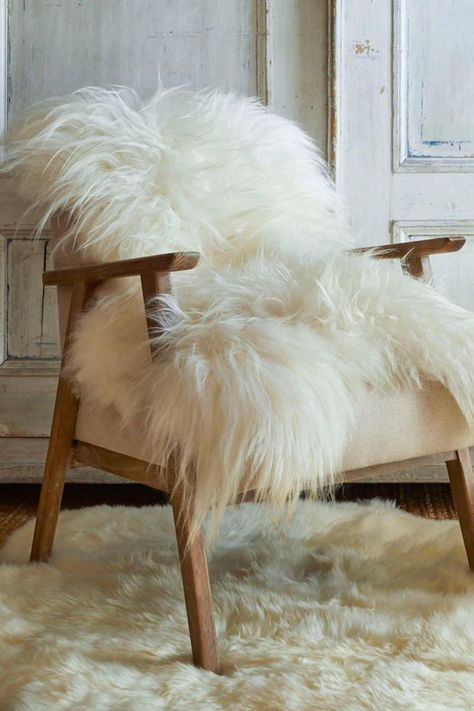 Relax in your bedroom or living room with the comfort and luxury of adding a Icelandic sheepskin rug to your home. Our rarebreed Icelandic sheepskins are ethically sourced from Iceland, where the indigenous nomadic Sami people rely on their longhaired flocks as a way of life. Discover more beautiful Scandinavian or Nordic sheepskin interior decor for your hygge lifestyle at https://www.hydeandhare.com/! Sami People, Cowhide Cushions, Nordic Interior Design, Sheepskin Throw, Fur Rug, Hygge Home, Scandinavian Interior Design, Nordic Interior, Sheepskin Rug