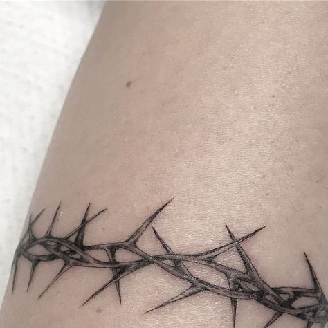 Crown of Thorns Tattoo Forehead Crown Of Thorns Ring Tattoo, Thorn Hip Tattoo, Collar Bone Tattoo Thorns, Barbwire Arm Band Tattoo, Crown Of Thorns Wrap Around Tattoo, Thorn Crown Tattoo Around Arm, Thorn Of Crowns Tattoo, Thorn Tattoo Wrist, Thorn Tramp Stamp