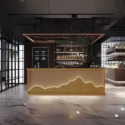 Our bar counter features a unique design that enhances the distinctive elegance of your business space, setting you apart from your peers. It serves as both a reception desk welcoming various clients and an ideal cashier counter, suitable for a variety of settings including bars, malls, and office areas. HOME BREW BLENDS LLC | HOME BREW BLENDS LLC Vintage Bar Reception Desk 110.23" Home Bar Wood in Brown | 31.49" H X 23.62" D X 110.23" L | Wayfair Dispensary Display Ideas, Host Stand Design, Bar Counter Design Home, Bar Reception Desk, Satellite Bar, Restaurant Counter Design, Cashier Counter Design, Asian Bar, Rooftop Bar Design