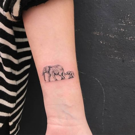 90 Magnificent Elephant Tattoo Designs | TattooAdore Mom Daughter Tattoos Elephant, 2 Elephant Tattoos, Elephant With Baby Tattoo, Elephant Tattoos Mom And Baby, Elephant Tattoos Mother Daughter, 2 Elephants Tattoo, Mom Elephant Tattoo, Elephant Tattoo Design For Women Small, Mama Elephant Tattoo