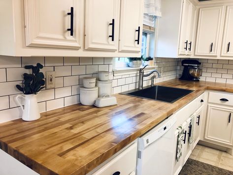 Butcher block counter top with subway tile backsplash Butcher Block Countertops Kitchen, Butcher Block Countertop, White Counters, Kitchen Ideas Dark Cabinets, Kitchen Ideas Dark, Farmhouse Kitchen Design, Patio Furniture Ideas, Dark Cabinets, Modern Farmhouse Kitchens