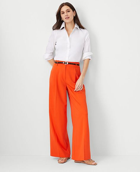 Our wide leg pant is a modern must-have with a perfect drape and high waist that endlessly flatters. Belt loops. Front zip with double hook-and-bar closure. Front pleats. Front off-seam pockets. Back besom pockets.,Leg Shape:Leg Shape: Wide Leg � a modern must-have with a statement leg and Flattering high waist,Rise:High rise: sits 1/2" to 1" below natural waist,Imported:Imported,Fit:Fit: Relaxed & easy,Length:Full length: 31" inseam with 26 1/2" leg opening,Fabrication:73% Polyester, 20% Rayon, 7% Spandex,Garment Care:Machine Washable The Single Pleated Wide Leg Pant by Ann Taylor Size regular - 12 Flame Azalea Women's Regular, Wide, Leg, Pants, 73%, Polyester, 20%, Rayon, 7%, Spandex, Machine, Washable Flame Azalea, Orange Pants Outfit, Petite Fashion Outfits, Clothes Capsule Wardrobe, Jeans Outfit For Work, Dressy Jeans, Executive Woman, Ruched Pants, Orange Pants