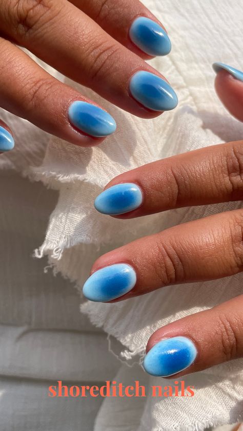 Blue aura nails almond shape nails orb nails blue trending nails trending nail art Small Cute Nail Designs, Short Natural Nail Designs Gel Blue, Cute Winter Nail Ideas Simple, Single Color Nail Designs, Hannukah Nail Ideas, Blue Aura Nails Almond, Blue Bubble Nails, Winter Aura Nails, Teal Aura Nails