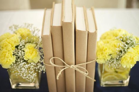 covered books centerpieces graduation | Yellow Carnation & Book Centerpieces Retirement Party Themes, Teacher Retirement Parties, Book Centerpieces, Book Themed Party, Yellow Carnations, Book Themed Wedding, Literary Wedding, Storybook Baby Shower, Book Launch Party