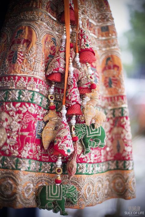 Pretty colorful gota lehenga with cute elephant latkans for wedding. See more on wedmegood.com  #wedmegood #indianwedding  #indianbride #latkans #tassels #bridallehenga #lehenga #lehengacholi Latkan Design, Tassels Fashion Clothing, Designer Tassels, Saree Tassels Designs, Best Blouse Designs, Saree Tassels, Tassels Fashion, Wedding Lehenga, Indian Wedding Outfits