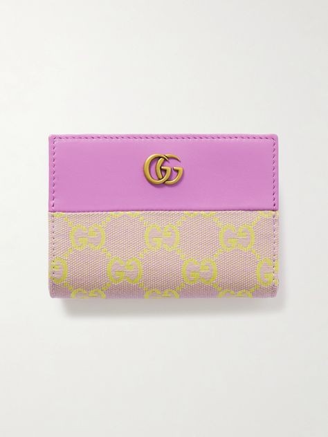 Gucci's wallet has been made in Italy from a combination of canvas-jacquard woven with the brand's iconic 'GG' monogram and smooth leather in a summery pink and yellow colorway. It has numerous slots for storing your cards and cash. Cute Card Wallet, Cute Designer Wallets, Gucci Designer Wallets With Logo, Designer Gucci Wallets With Logo, Luxury Gucci Wallet With Logo, Gucci Travel Wallets With Card Slots, Gucci Wallets With Card Slots For Travel, Rectangular Gucci Wallet For Travel, Designer Rectangular Wallets With Logo