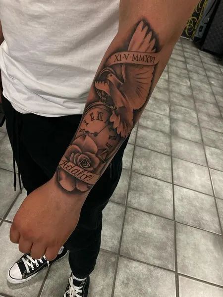 Forearm Dove Tattoo Rip Arm Tattoo Men, Men Dove Tattoo, Rip Grandma Tattoo For Men Forearm, Angle Tattoo For Men Forearm, Dove Sleeve Tattoo For Men, Rip Tattoos For Women Forearm, Make Forearm Tattoo, Forearm Memorial Tattoos For Men, Dove Tattoo Men Sleeve