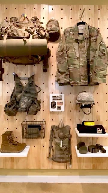 myWall by AdaptivDC on Instagram: "Our founder and veteran, Chris, demonstrates how easy it is to organize his military gear with the myWall system. The customizable peg wall lets you safely store everything from your uniform to your equipment. This is National Military Appreciation Month upgrade your storage system and proudly display your gear." Army Gear Storage, Uniform Storage Ideas, Military Room Ideas, Military Gear Organization, Military Gear Storage, Military Bedroom, Camo Rooms, Military Home Decor, Military Office