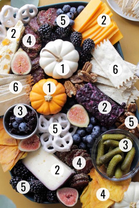 Learn how to build a fall charcuterie board with a shopping list of the best Trader Joe’s items of the season! This elegant cheese board is perfect for the fall season, including on game day, as a Thanksgiving appetizer platter, or even for an easy happy hour appetizer. Although the aesthetic of this charcuterie board is bright and beautiful, it is actually simple to make! With the help of a video, I’ll show you how to make this fall charcuterie board with all my helpful tips & tricks! Charcuterie Board List Trader Joes, Fruit And Veggie Board Ideas, Office Charcuterie Board, Thanksgiving Kids Charcuterie Board, Pie Board Ideas, Trader Joes Fall Charcuterie Board, Trader Joe’s Charcuterie Board Thanksgiving, Thanksgiving Carchutiere Board, Thanksgiving Charcuterie Board Ideas Simple