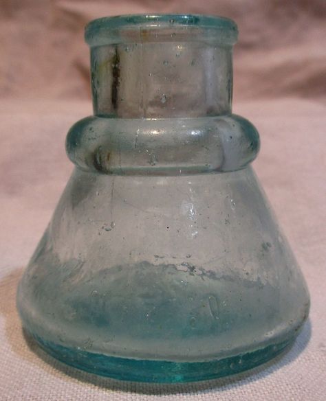 "Don't you just love old ink bottles like these? They are so evocative of a more romantic time, when people took time to write letters, by hand, in cursive! Plus little bottles like these are really useful as bud vases. This one is quite old and features old wavy glass with some bubbles in the glass. The glass is a light blue / aqua / teal color. The bottle is in unusual and totally unique condition, as it looks like the glass blower had one side soften and \"dent\" so what you see in the close Vintage Calligraphy, Writing Materials, Calligraphy Writing, Teal Glass, Write Letters, Antique Glass Bottles, Ink Bottle, Paper Pencil, Pencil Pen