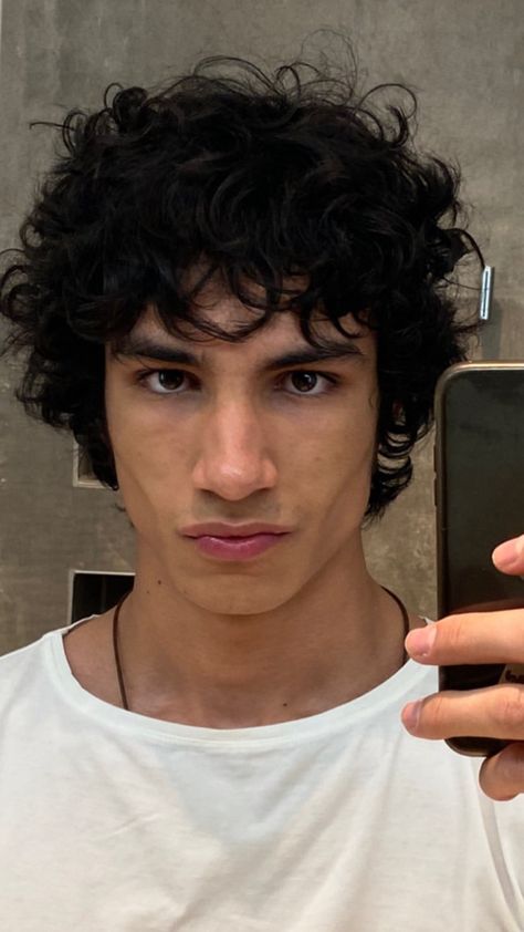 curly head boy, mixed boy, black haired boy, mirror pic, white shirt with curly boy Shaggy Curly Hair, Curly Boy, Fade Undercut, Curly Hair Model, Long Curly Hair Men, Men's Curly Hairstyles, Curly Head, Male Haircuts Curly, How To Grow Hair