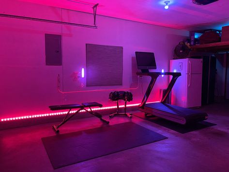 A little bit of lightning goes a long way in a garage. Sweating in neon lights is a little more fun. Led Lights Gym Room, Gym With Neon Lights, Home Gym Neon Lights, Gym With Led Lights, Garage Gym Led Lights, Home Spin Studio, Workout Room Lighting, Garage Gym Lighting Ideas, Home Gym Led Lighting