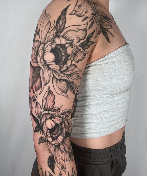 Peony floral half sleeve for Jessica. Healed lines and top floral, fresh shading in the bottom peony. Very happy to finally finish this one. 🖤 - - - #peony #blackwork #tattoo #illustrative #ornamental #floral #midwest #michigantattooers Peony Arm Sleeve Tattoo, Peony Sleeve Tattoo, Ornamental Blackwork Tattoo, Floral Ornamental Tattoo, Peony Tattoo, Peonies Tattoo, Arm Sleeve Tattoos, Stick And Poke, Floral Sleeve