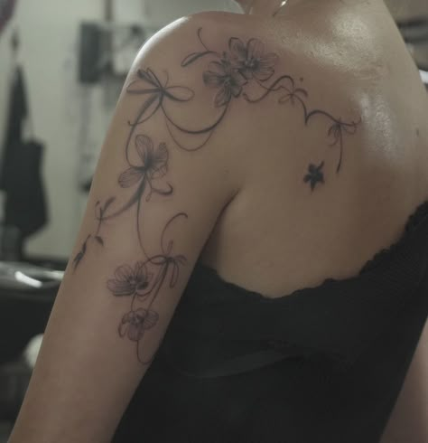 Skeleton Flowers, Floral Back Tattoos, Wrap Around Tattoo, Wrap Tattoo, Aries Tattoo, Ribbon Tattoos, Skeleton Tattoos, Back Of Shoulder Tattoo, Flower Tattoo Shoulder