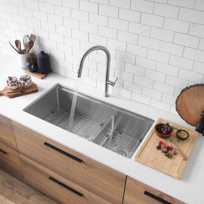 This extra-large double bowl workstation sink revolutionizes the way you work in the kitchen. Inspired by professional kitchens and designed for the modern home chef, our VERSA36 workstation sink transforms your kitchen sink into a multifunctional hub for culinary creativity.Crafted from durable 16-Gauge stainless steel, this sink features refined 10mm rounded corners and a seamlessly integrated ledge system. With a slim and low divider offering a 60-40 split and a generous 10" depth, it accommo Large Basin Kitchen Sink, Double Sink Kitchen, Three Compartment Sink, Sink Remodel, Stainless Steel Double Bowl Kitchen Sink, Large Kitchen Sinks, Workstation Sink, Sinks Kitchen, Double Kitchen Sink