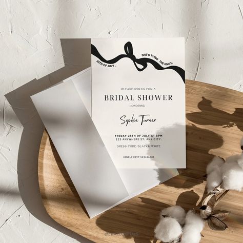 Introducing our Bow & Ribbon Bridal Shower Invitation! This unique and chic template features a delicate bow and ribbon design, perfect for adding a touch of elegance and charm to your celebration. Ideal for a Bridal Brunch, this editable and printable invite allows you to effortlessly customize details to match your event. With its stylish and sophisticated vibe, it's the perfect way to announce your special day in a memorable fashion. Click on this link for more magic: https://www.etsy.com/sho Bow Invitation, Hens Party Invitations, Invite Card, Party Things, White Bridal Shower, Bow Ribbon, Bridal Brunch, Engagement Party Invitations, Ribbon Design