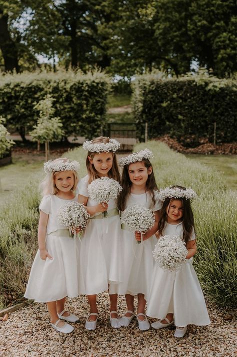 Four flower girls in white dresses and white ballet shoes with small round gypsophila bouquets with matching gypsophila flower crowns Kids Bridesmaid Dress, Gypsophila Bouquet, Gypsophila Wedding, Flower Girl Bouquet, Flower Girl Crown, White Flower Girl Dresses, Flower Crown Wedding, Wedding Dresses For Girls, Wedding Flower Girl