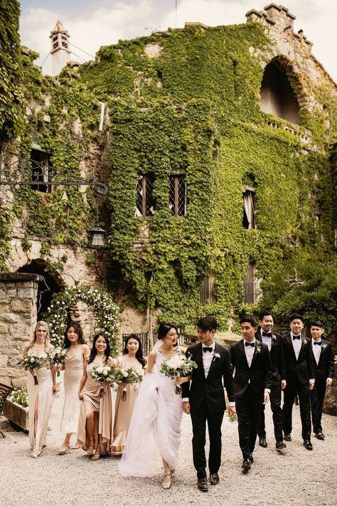 Bride in a white wedding dress with the groom and groomsmen in black tie and bridesmaids in champagne gold dresses for La Baronia castle outdoor wedding La Baronia Wedding, Italian Black Tie Wedding, Black Tie Italian Wedding, Garden Black Tie Wedding, Italian Wedding Bridesmaids Dresses, Black Tie Wedding Aesthetic, Black Tie Groomsmen, Champagne And Black Wedding, Black Tie Wedding Party