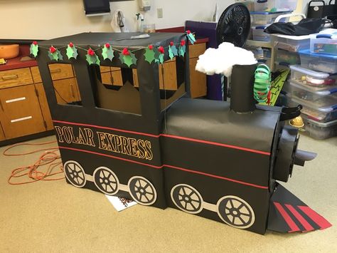 Cardboard train polar express library display Cardboard Train, Polar Express Christmas Party, Polar Express Theme, Train Crafts, Christmas Parade Floats, Polar Express Party, Cardboard Creations, Ward Christmas Party, Train Projects