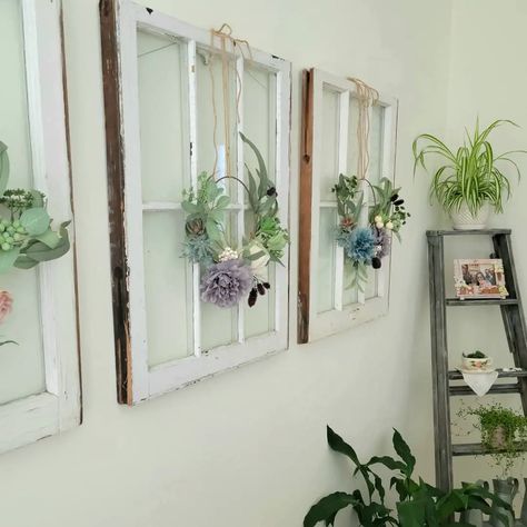 These repurposed old windows can add a touch of charm and character to the space. The peeling paint and worn edges create a unique, rustic look that adds a sense of history and nostalgia to your home. They look great with simple wreaths, making them so beautiful as a unique wall hanging. Vintage window decor from @bebefinihome Windows As Wall Decor, Decorating With Old Windows, Vintage Wall Decor Ideas, Vintage Window Decor, Simple Wreaths, Add Character To Your Home, Vintage Window, Peeling Paint, Vintage Windows