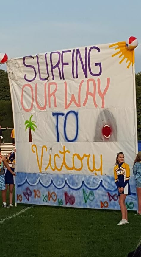 Beach Theme Run Thur Beach Cheer Theme, Homecoming Float Ideas Theme, Homecoming Float Themes Ideas, Beach Theme Run Through Sign Football, Beach Theme School Spirit, Beach Themed Football Signs, Beach Homecoming Float, We Run This Beach Football Poster, Disney Pep Rally Ideas