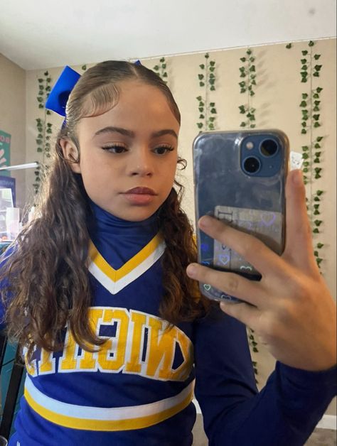 Cheerleading Hairstyles Curly Hair, Drill Team Hairstyles, Curly Hairstyles For Cheerleaders, Curly Hair Cheerleader, Cheer Half Up Half Down Hair With Bow, Half Up Half Down Hair Cheerleading, Basketball Cheer Hairstyles, Hairstyles With Cheer Bows, Half Up Half Down Cheer Hair Bows