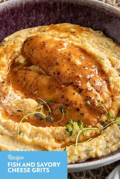 Dive into a culinary delight with this mouthwatering fish and creamy cheese grits recipe. Perfectly seasoned fish pairs beautifully with rich, velvety grits, creating a comforting dish that's both satisfying and elegant. Whether you're planning a cozy dinner at home or looking to impress guests, this recipe is sure to become a favorite. Simple to make yet full of flavor, it's an ideal choice for seafood lovers and comfort food enthusiasts alike. Get ready to savor every bite of this delicious combination! Cod And Grits, Blackened Catfish And Grits, Scallop And Grits Recipes, Cajun Cheese Grits, Fish And Grits Sauce, Salmon And Grits Breakfast, Tilapia Breakfast, Fish & Grits Recipe, Catfish And Grits Soul Food