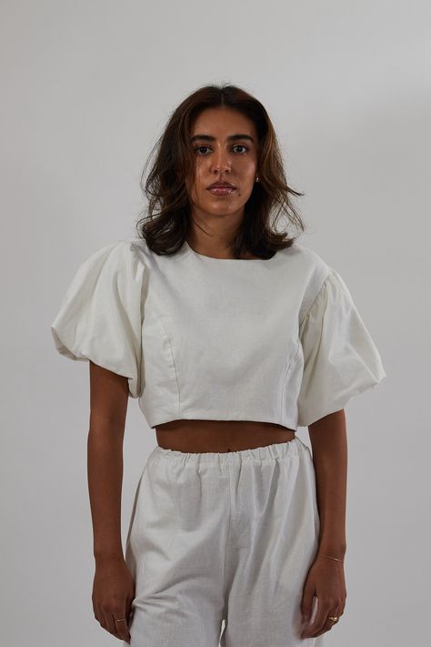 The puffy sleeve, top featuring panels for shaping, as well as a zipper closure.100% linen.Models are wearing a size small.Length of top = 33cm. Puffy Sleeves Top, Puffy Sleeve Top, Sleeves Top, Puffy Sleeves, The Grace, Chloe, Sleeve Top, Size Small, Models