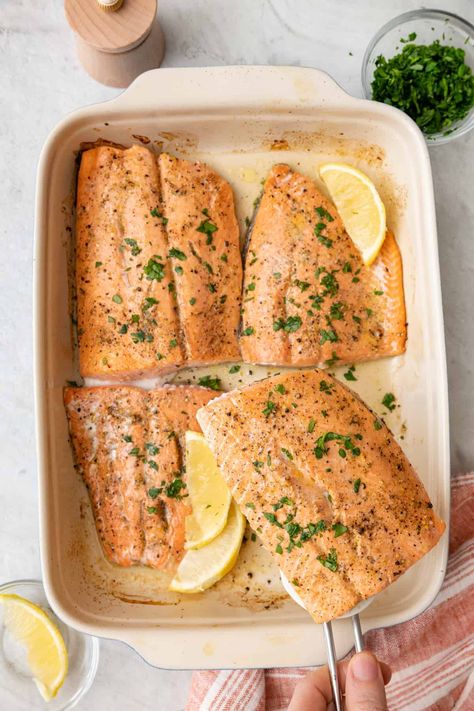 This recipe for lemon pepper salmon is both quick and easy to prepare. It's a protein-rich dinner option with a sharp, citrusy flavor punch. | Lemon Pepper Salmon | Baked Lemon Pepper Salmon | Baked Salmon with Lemon | Lemon Pepper Salmon Recipe | Lemon Pepper Salmon in Oven | Lemon Pepper Fish | Feelgoodfoodie Recipes, Salmon In Oven, Lemon Pepper Fish, Healthy Fish Dinners, Baked Salmon With Lemon, Baked Salmon Lemon, Lemon Pepper Salmon, Salmon Baked, Salmon With Lemon