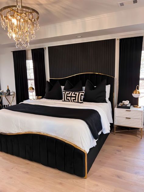 black & gold bed frame, unique asymmetrical bed frame, black throw pillows, black curtains, white bedding, modern bedroom style Black Gold Bed Frame, Black Bedroom Decor Beds & Frames, Room Decor With Black Bed Frame, Black And Gold Aesthetic Bedroom, Gold And Black Bedroom Decor Ideas, Black And Gold Bed Frame, Black White Gold Room Bedrooms, Black And White Gold Bedroom Ideas, Black Bed With White Furniture