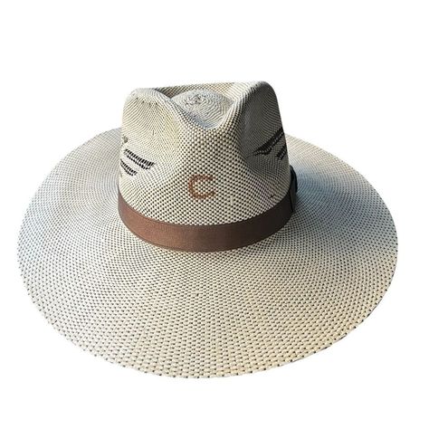 The Charlie 1 Horse Western Straw Hat In A Rich Brown Hue Is Your Perfect Companion For Sun-Soaked Adventures. Its Solid Straw Construction Offers A Lightweight Feel, While The Signature Charlie 1 Horse Branding On The Crown Adds A Touch Of Authentic Western Flair. Ideal For Rodeos, Country Music Festivals, Or Casual Outings, This Hat Is Designed For Unisex Adults Who Appreciate Style And Comfort. With Its Large Size, It Ensures A Comfortable Fit For All-Day Wear. New With Tags (Nwt). Keywords: Horse Branding, Western Straw Hat, Rodeo Hat, Horse Brand, Horse Western, Country Music Festival, Crown Pattern, Horse Accessories, Festival Hat