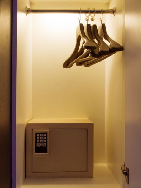 12 Smart Places to Hide a Safe  ||  Keep the whereabouts of your valuables on lock with these secret storage ideas https://www.bobvila.com/slideshow/12-smart-places-to-hide-a-safe-53100?slide_name=12-hidden-safes-that-can-thwart-burglars& Closet Safe Ideas, Secret Storage Ideas, Closet Safe, Safe Lockers, Small Safe, Secret Hiding Places, Hidden Safe, Hide Money, Hidden Pantry