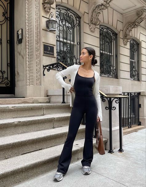 Flare Leggings Cardigan Outfit, Flair Jumpsuit Outfit, Body Suit Pants Outfit, Flare Pants And Cardigan Outfit, Unitard And Cardigan Outfit, Black Jumpsuit Outfit With Cardigan, Jumpsuit Outfit Leggings, Black Active Jumpsuit Outfit, Bodysuit With Cardigan Outfit