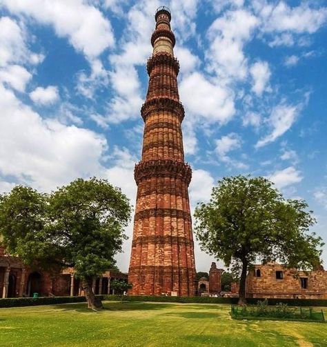 As you land in Delhi, the first monument you visit is the tallest brick minaret in the world - the Qutub Minar!  Read more about it here: https://expedition2india.com/information-on-india/monuments-of-india/qutub-minar#monuments-of-india  #india #incredibleindia #qutubminar #delhi #usa #usatoindia #monumentsofindia #traveler Famous Monuments Of India, India Monuments, Monuments Of India, Delhi Monuments, Monument In India, Delhi Tourism, Ancient Indian History, Qutub Minar, Travel Destinations In India