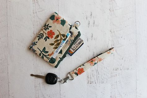 "Floral wristlet wallet - ID holder Let's face it, there are times when we are going to run a quick errand, and having to lug a big bag (full of a whole lot of nothing needed for a quick errand!) is not really necessary, so the Grab and Go is just the perfect and handy size to hold your ID, drivers license  and some cash! This pouch is made from a rifle paper co floral print canvas fabric. The pouch features a fabric slip pocket with a hook and loop closure,  nylon coil zipper, layers of interfa Pads Tampons, Canvas Wallet, Canvas Purse, Id Wallet, Floral Bags, Mini Pouches, Wallet Gifts, Pencil Pouch, Gifts For Nature Lovers