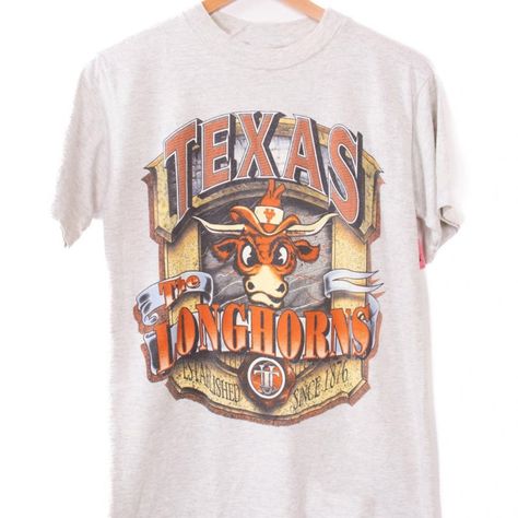 Vintage Ncaa Texas Longhorns Logo T-Shirt, Texas Longhorns Shirt, University Of Texas, Unisex T-Shirt Sweatshirt, Vintage Shirt Our Classic T-Shirt Serves As The Perfect Short-Sleeved Shirt For Your Unique, Funny, Or Personalized Designs. Brand: Gildan Heavy Weight Fabric Classic Unisex Makes This An Easy Fit Size Up If You Want Something Roomier Our Shirts Materials: 100% Cotton ** Note: - Double Check Your Address Before Ordering. - If You Want To Return The Goods, You Are The One To Pay The S Texas Longhorns Shirts, Texas Longhorns Logo, Texas Longhorns Football, Texas Football, 90s Sweatshirt, Texas Shirts, College Shirts, Camo Shirts, Sweatshirt Vintage