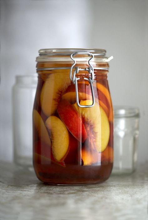 Enjoy the taste of summer year-round by preserving fruits in brandy. Brandied fruit is delicious on ice cream or pound cake. Brandied Fruit, Brandy Recipe, Eastern European Recipes, Homemade Liquor, Liquor Recipes, Liqueurs Recipes, Fermentation Recipes, Canned Fruit, Homemade Wine