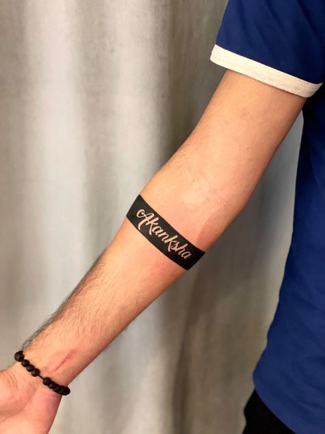 Half Sleeve Band Tattoo, Band Tattoo Designs With Name, Arm Band Tattoo With Names, Armband Tattoo With Name, Arm Band Name Tattoo, Name Band Tattoo Design, Black Band Tattoo Meaning, Tattoo Name Ideas For Men, Arm Band Tattoo Designs For Men