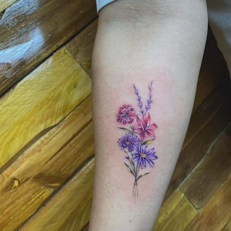 Forearm Aster Flower Tattoo Bright Idea Flower Tattoo Carnation, Aster Flower Tattoo, Gladiolus Flower Tattoos, Aster Tattoo, Aster Flower Tattoos, Violet Flower Tattoos, Gladiolus Tattoo, Flower Tattoo Meanings, Lavender Tattoo